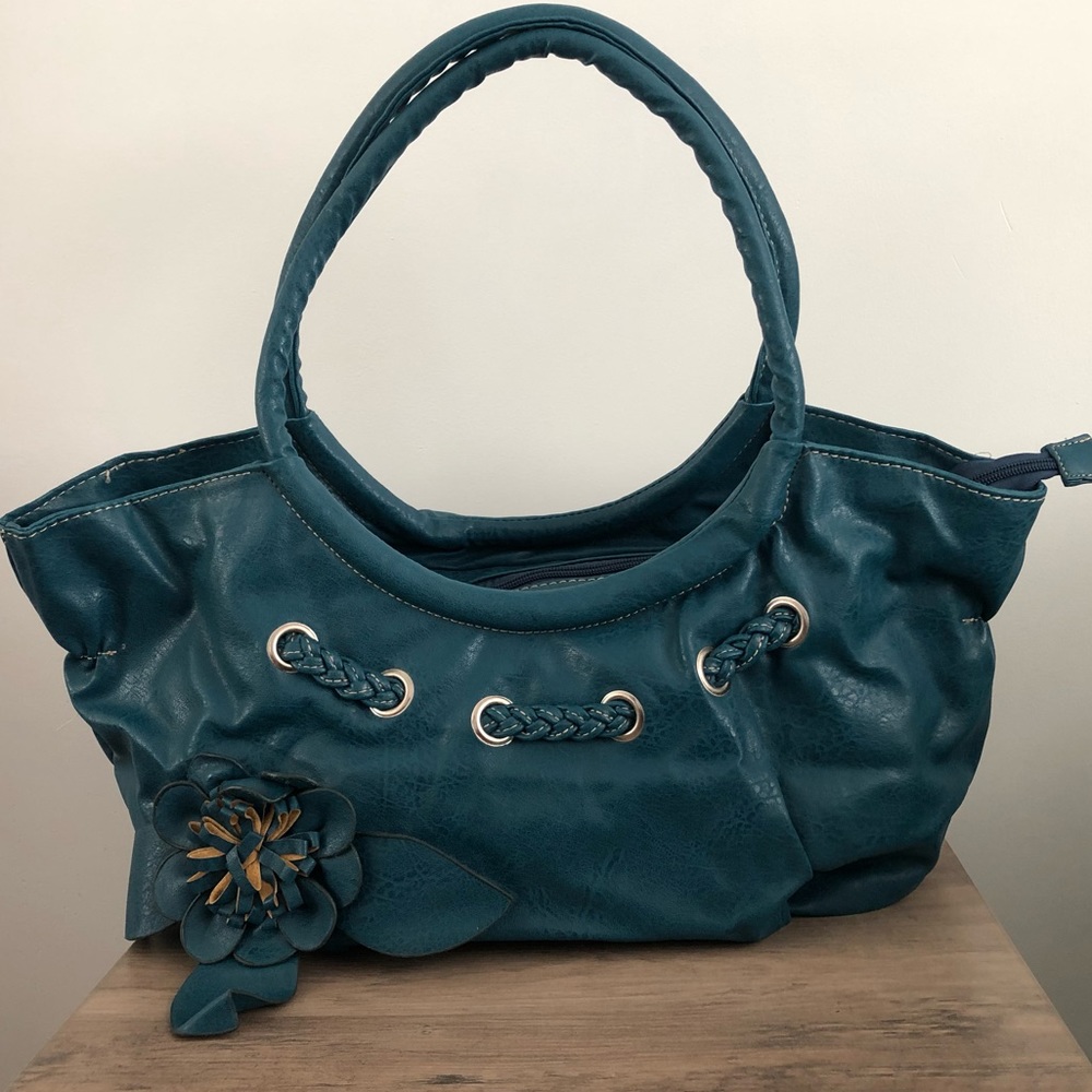 Blue Handbag with Flower and Rope Accents